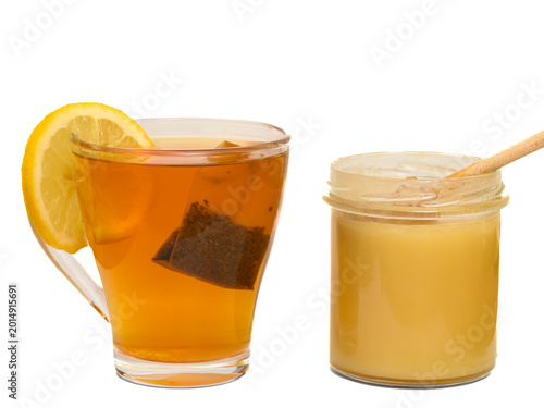 Canvastavla Hot tea with lemon and honey in a glass