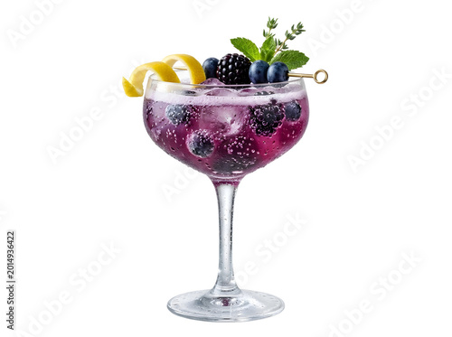 Refreshing purple gin and tonic cocktail with blueberries, blackberries, ice, lemon twist, and mint garnish in a balloon glass on black background.