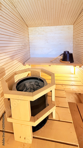 Modern Scandinavian Sauna Room with Warm Wooden Interior for Relaxation and Wellness