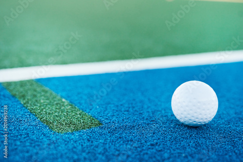 Obraz na płótnie Hockey, closeup and ball with empty pitch for training, outdoor practice and tournament with space
