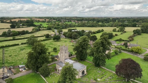 Aerial Close View of St Edmund Parish Church and Cemetery in Warkton Northamptonshire England