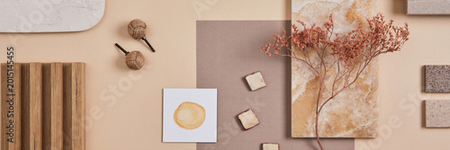Foto Flat lay of stylish architect moodboard composition with beige samples of textile, paint, wooden lamella panels and tiles