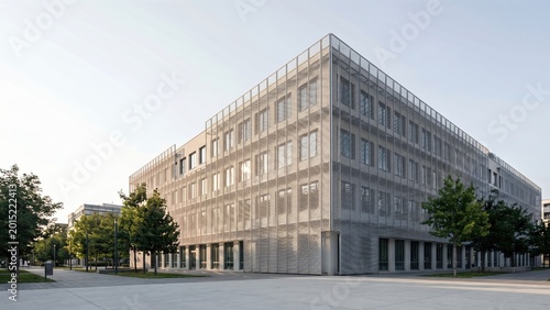 Modern architectural design of a sleek urban building with glass and metal surfaces