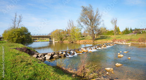 Bild auf Leinwand Mangfall river with rocks and cascade, bridge
