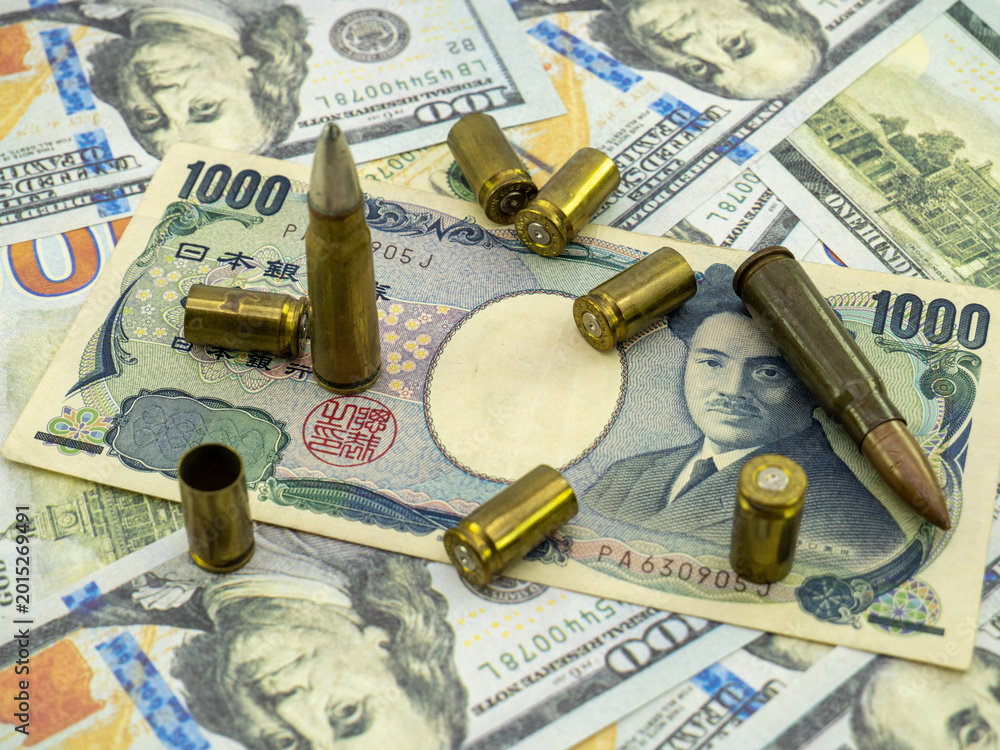 Naklejka premium japansese yen and ammunition spread, arming buying concept