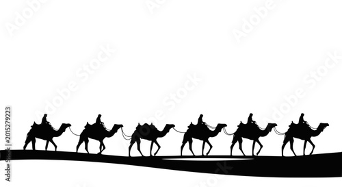Fotografie Camel caravan silhouette crossing desert landscape