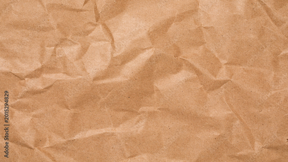 Fototapeta premium crumpled brown paper background,Crumpled Paper Poster Photo Effect Mockup,Crumpled Paper texture overlay effec,crumpled kraft paper background