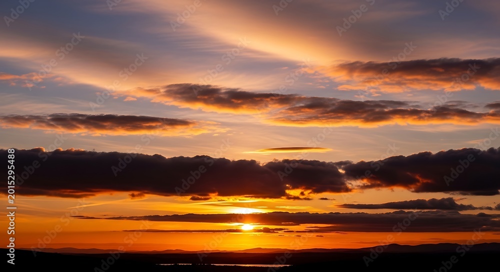 Naklejka premium Vibrant sunset with orange clouds sky.