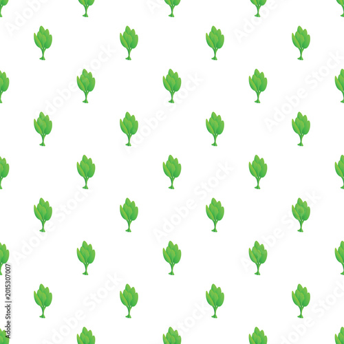 Repeating spinach leaves creating a fresh green background or healthy food pattern