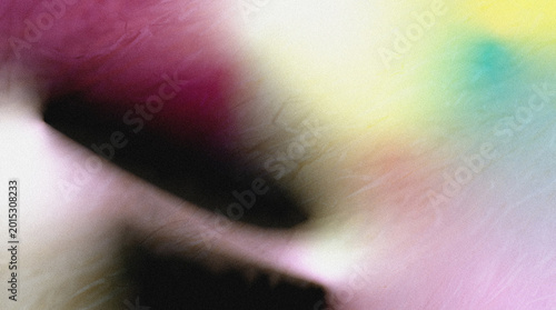 Abstract colorful blurred background with vibrant hues of pink, yellow, and green creating a dynamic visual effect suitable for artistic or design purposes