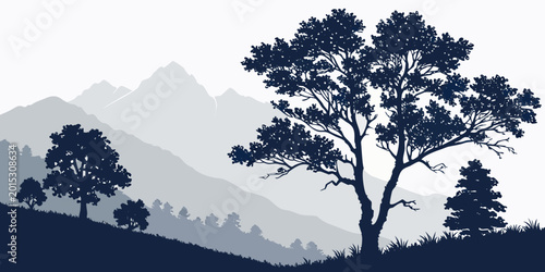 Fotografie Silhouette of a large majestic tree with smaller trees and mountains in a soft g