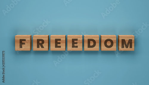 Schilderij op canvas Freedom Cubes: Wooden blocks spell out the word freedom, a simple yet powerful symbol of liberty and liberation against a calm, inviting backdrop