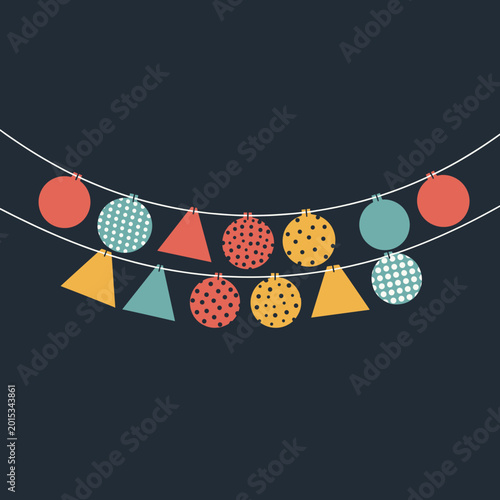 A colorful string of geometric bunting with circles and triangles against a dark background, perfect for celebrations.