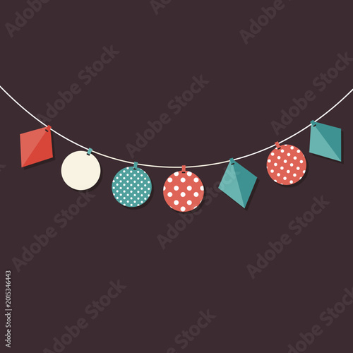 A colorful string of decorative flat design banners and bunting with various shapes and patterns against a dark background.