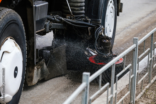 Konstfotografi Vehicle sweeping streets, cleaning up sidewalk