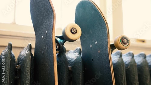 Skateboards leaning On a Radiant Heater