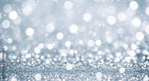 Christmas sparkling silver bokeh lights background