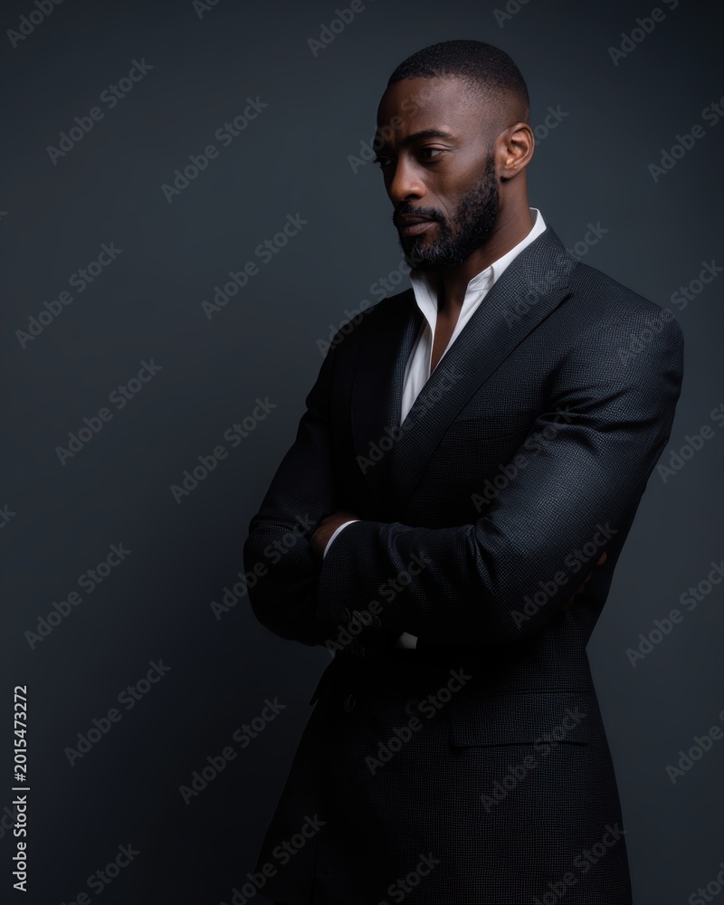 Fototapeta premium Stylish African-American businessman portrait, corporate concept