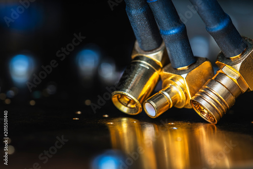 Signal cables with gold plated micro coaxial connectors used for transmitting electrical signals for audio, video, data, or measurement applications.