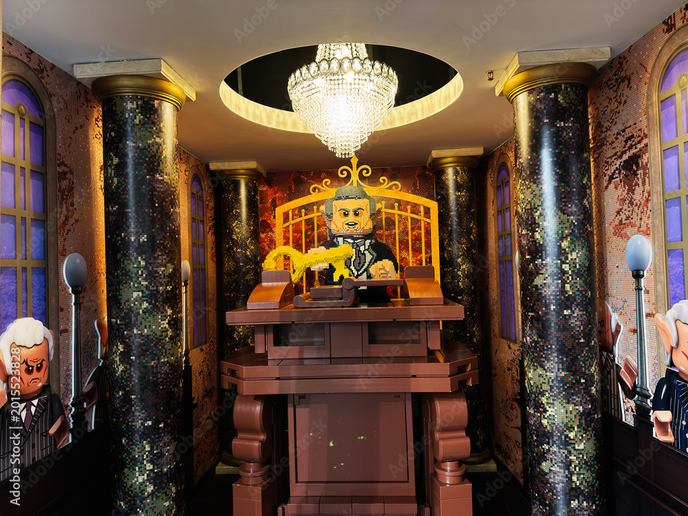 Fototapeta premium Lego style judge in an ornate courtroom with chandelier and marble columns in London, UK, toy legal scene with gavel on judge bench
