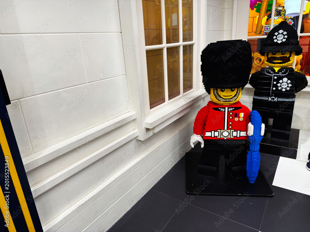 Fototapeta premium Lego guard and policeman brick sculptures in a London UK toy store window display