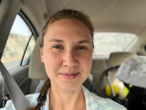 Female sitting in the car 