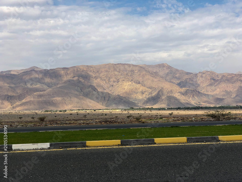 driving along the highway through the Arabian desert