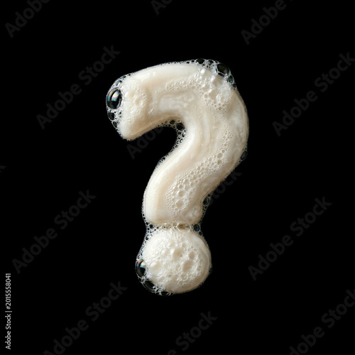 Solid soap with bubbles and foam interrogation point - creative symbol isolated on black background. Perfect alphabet for creative illustrations related to beauty, hygiene, purity...