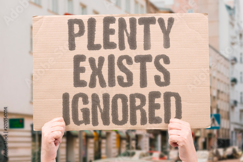 Schilderij op canvas "Plenty Exists Ignored" Surplus resources exist yet millions remain unable to access basic needs