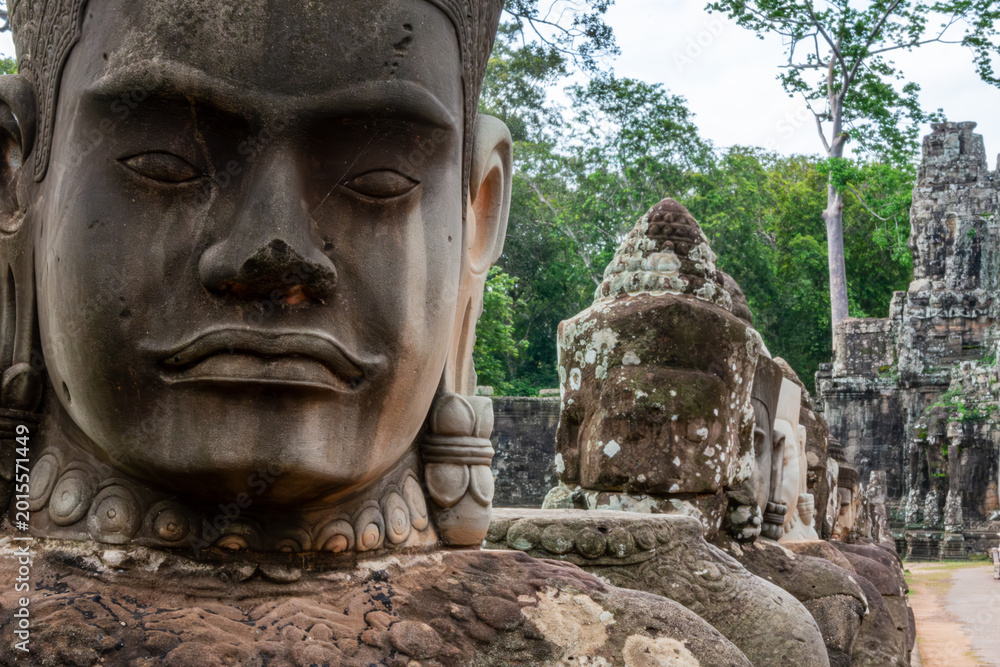 Obraz premium Close-up of Deva stone face at Angkor Thom, Cambodia.
