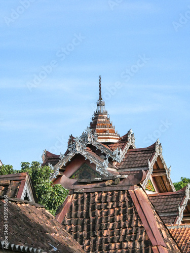 Bild auf Leinwand Iconic Tiered Javanese Roof With White Ornate Chofa Over Historic Heritage House