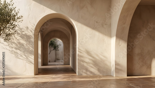 Sunlit arched hallway with olive tree in courtyard