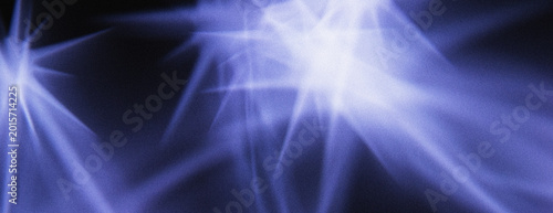 Abstract blue light rays and stars on black background with cinematic light leak effect, cosmic energy and neon streaks for modern design wallpaper.	
