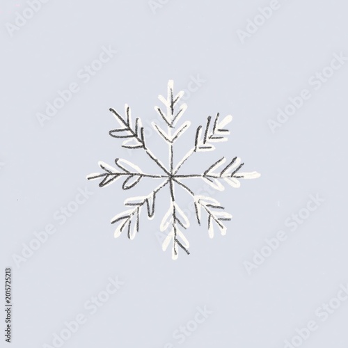 Stylized Hand-Drawn Snowflake Illustration with Textured Lines on a Light Blue Background
