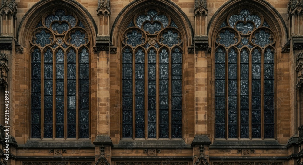Obraz premium Gothic styled windows on a historic building exterior showcase Architecture