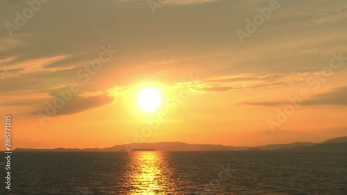 Beautiful Sunset Over the Sea in Japan with Distant Island Silhouettes