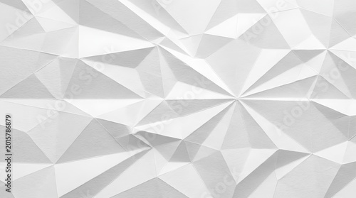 Abstract white geometric pattern with triangular shapes and soft light creating modern texture