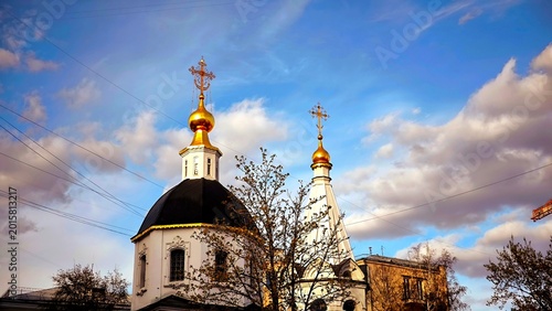 Photography Moscow, Russia - April 23, 2026: Orthodox church domes with golden crosses