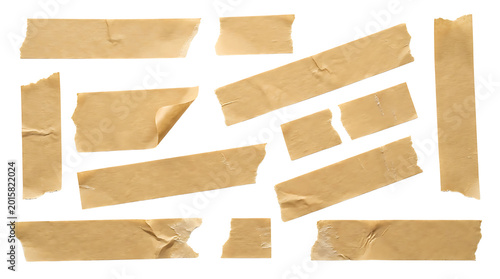 Set of torn beige masking tape pieces with wrinkled textures for scrapbooking and collage design on black background photo