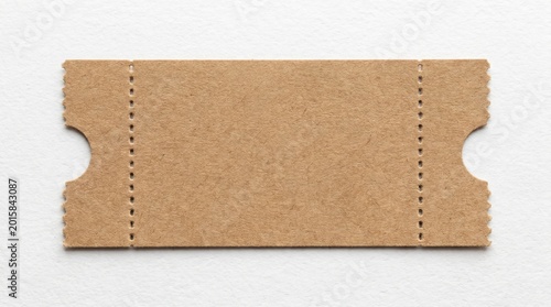 Blank brown paper ticket with perforated edges and rounded cutouts, placed on white textured surface, minimalist admission or event template design.