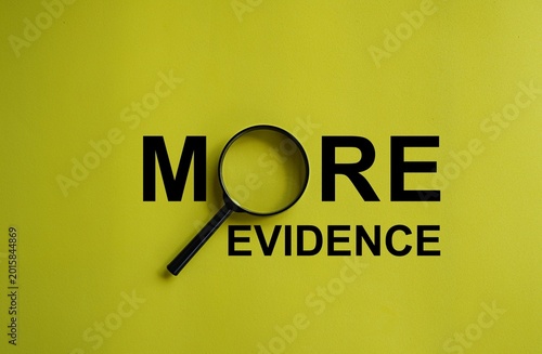 Bilde på lerret Lenses form the letter O on the word MORE evidence