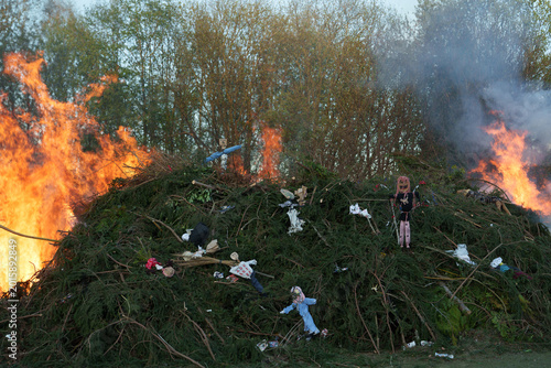 Photos Ignition of large bonfire with witches effigies during spring festival near Libe