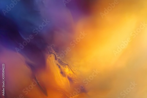 Abstract swirls of purple, blue, and vibrant orange paint textures