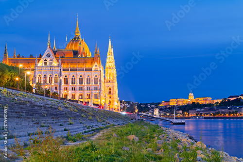 Budapest Parliament building by the river at night