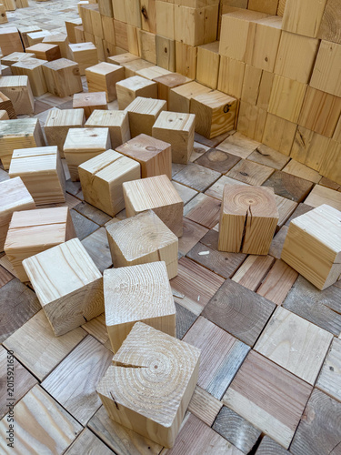 Φωτογραφία Square pine wood blocks for flooring or construction, natural timber cubes for i
