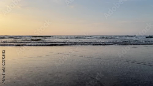 4K Symmetric Ocean Waves Reflection on Sandy Beach