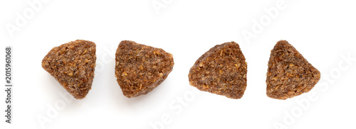 Bild auf Leinwand Dry pet food macro pieces isolated, cat kibble closeup, dog pellets, small prote