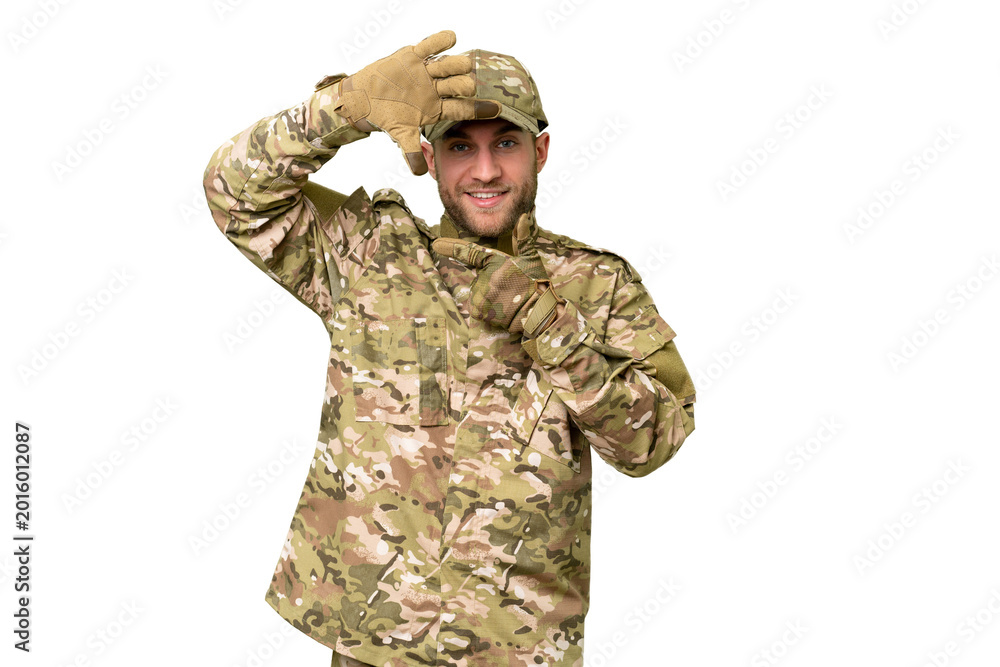 Fototapeta premium Military man over isolated chroma key background focusing face. Framing symbol