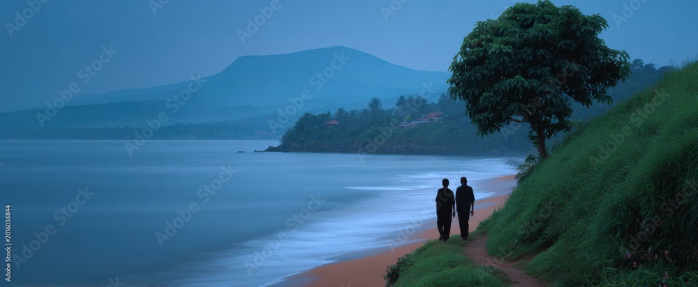 Fototapeta premium Sore stroll along the coast with lush hills in the distance