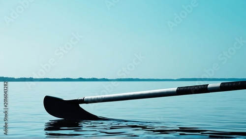 Rowing Oar Over Calm Water